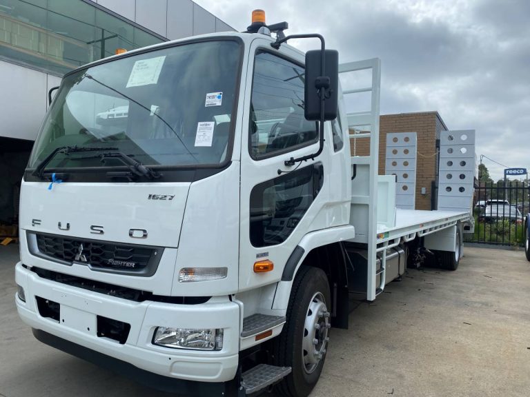 FUSO truck with custom beavertail tray and toolboxes